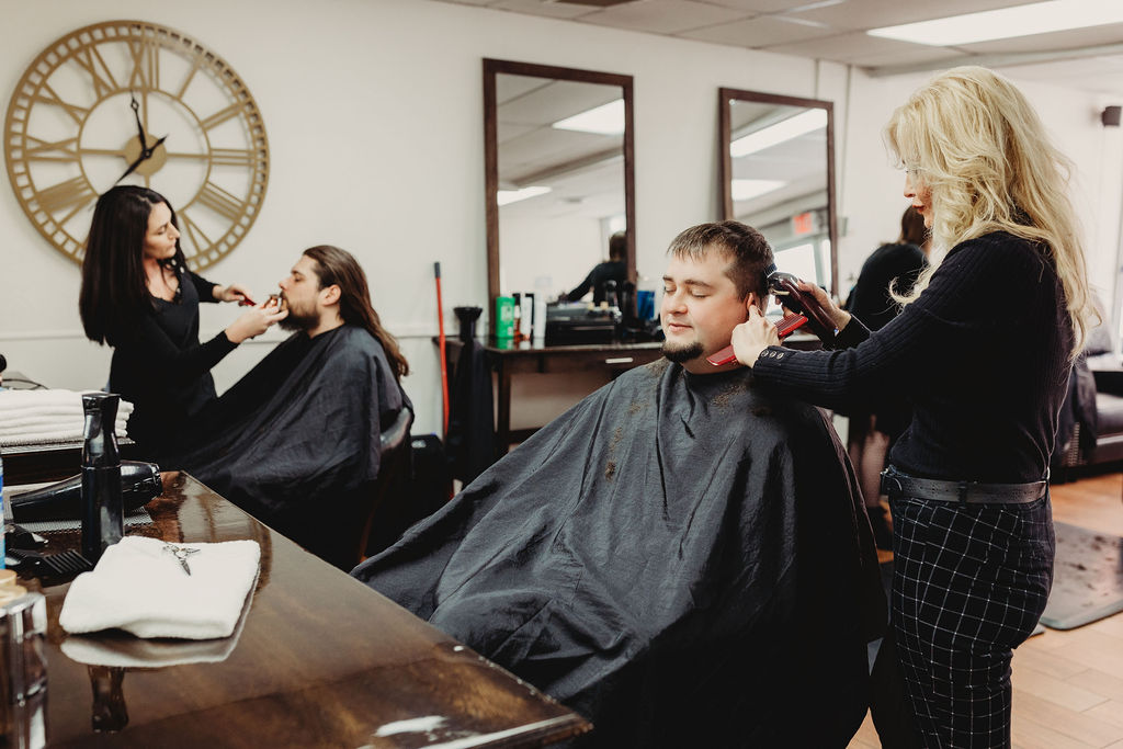 Stylists working the floor at The Gentleman's Salon in State College, PA